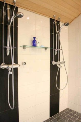 shower area with two showers